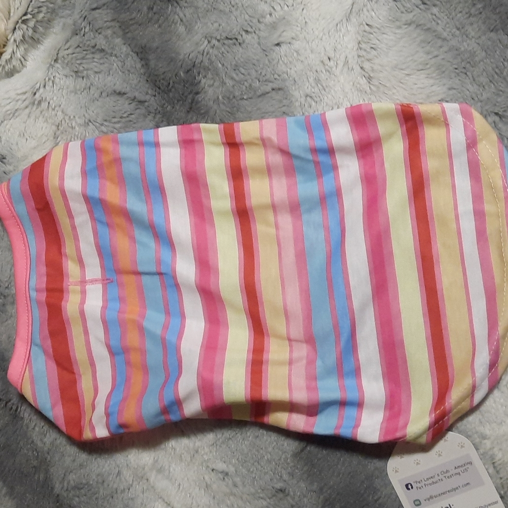 Pet T -shirt  sized med but fits like  a small